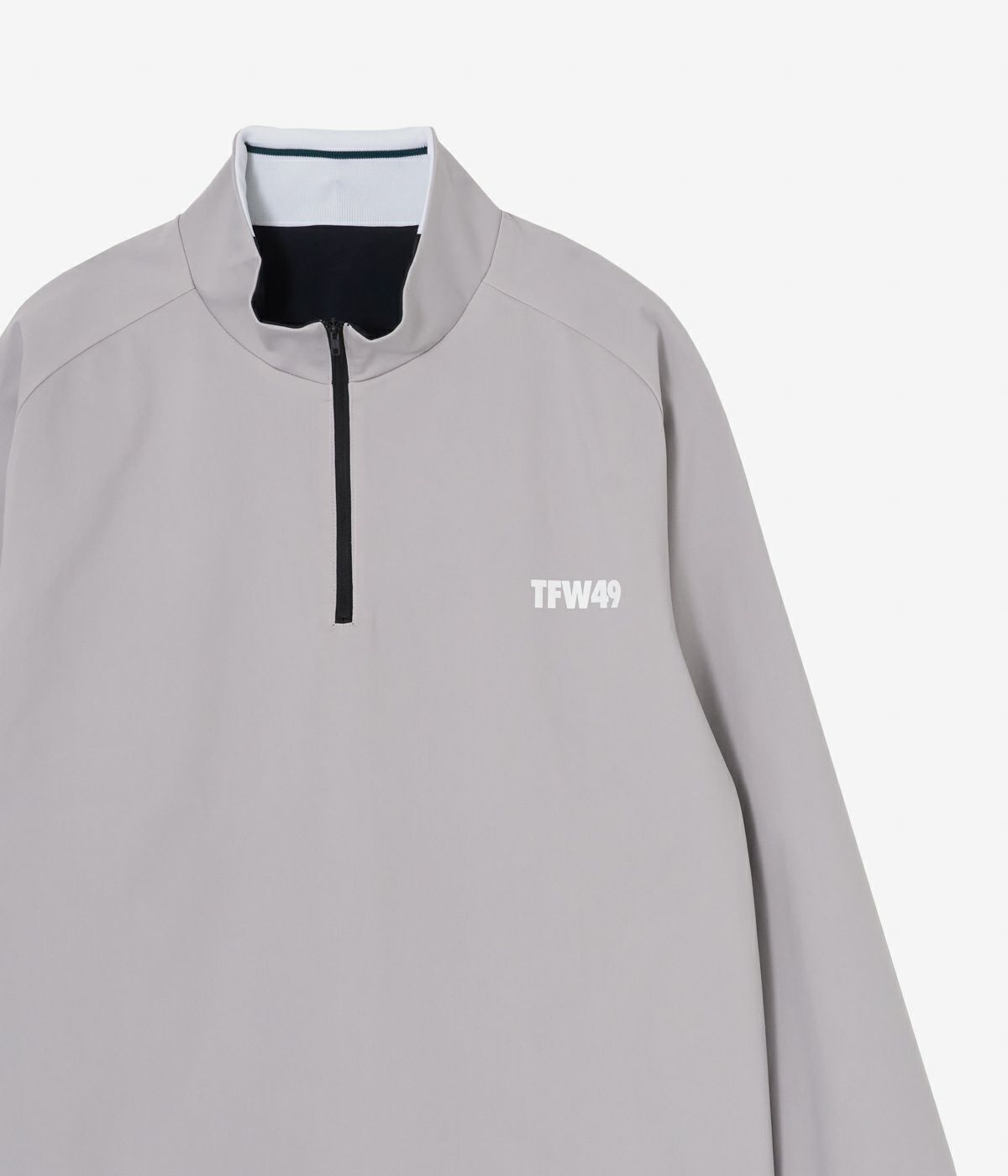REVERSIBLE STRETCH HALF ZIP | TFW49（ティーエフダブリュー 